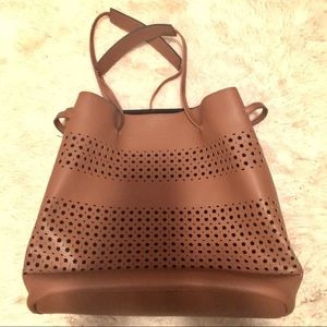 Vegan leather laser-cut bucket bag